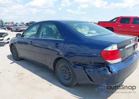 2005 Toyota Camry Le z USA, uszkodzony, nr VIN 4T1BE32K15U426477